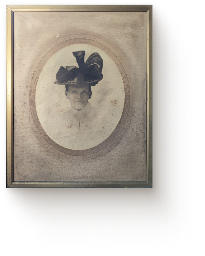 Photo of the founder of Wyles Sweet Shop from the 1890s, a lady wearing a hat with a large bow, Victorian style clothing